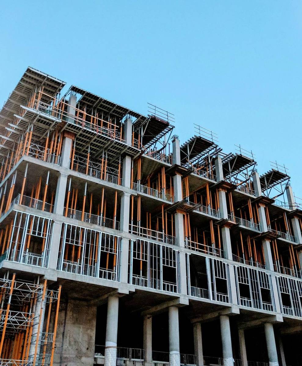 A mid-rise commercial building under construction