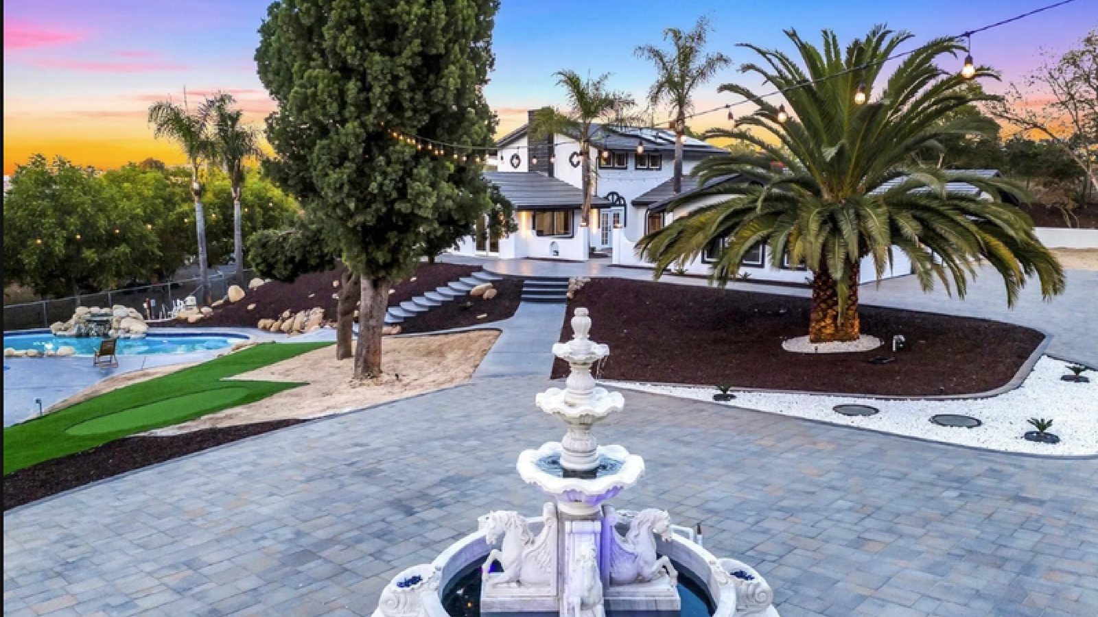 Backyard with pool & putting green