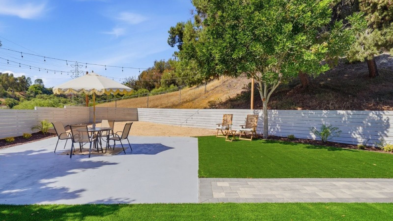 Backyard patio with string lights